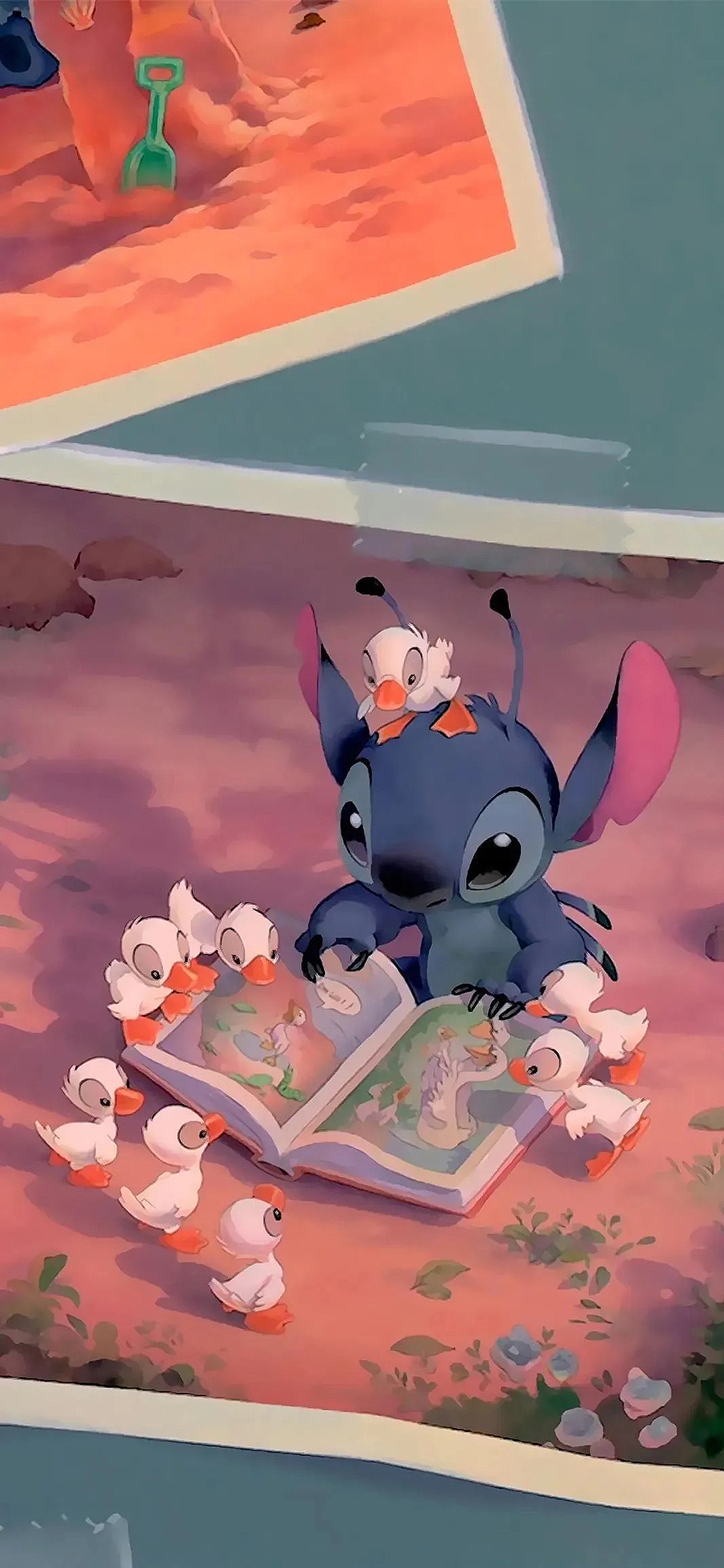 [2436×1125]史迪仔 迪士尼 阅读 鸭子 苹果手机动漫壁纸图片
