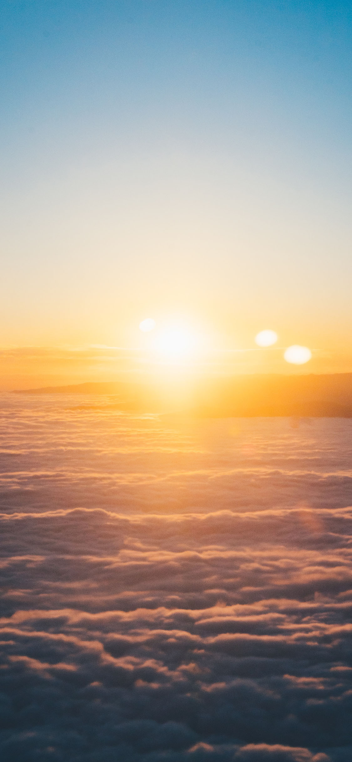 [2436×1125]云彩 云海 阳光 天空 苹果手机壁纸图片
