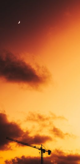 [2436x1125]云空 晚霞 红云 建筑设施 升降架 苹果手机壁纸图片