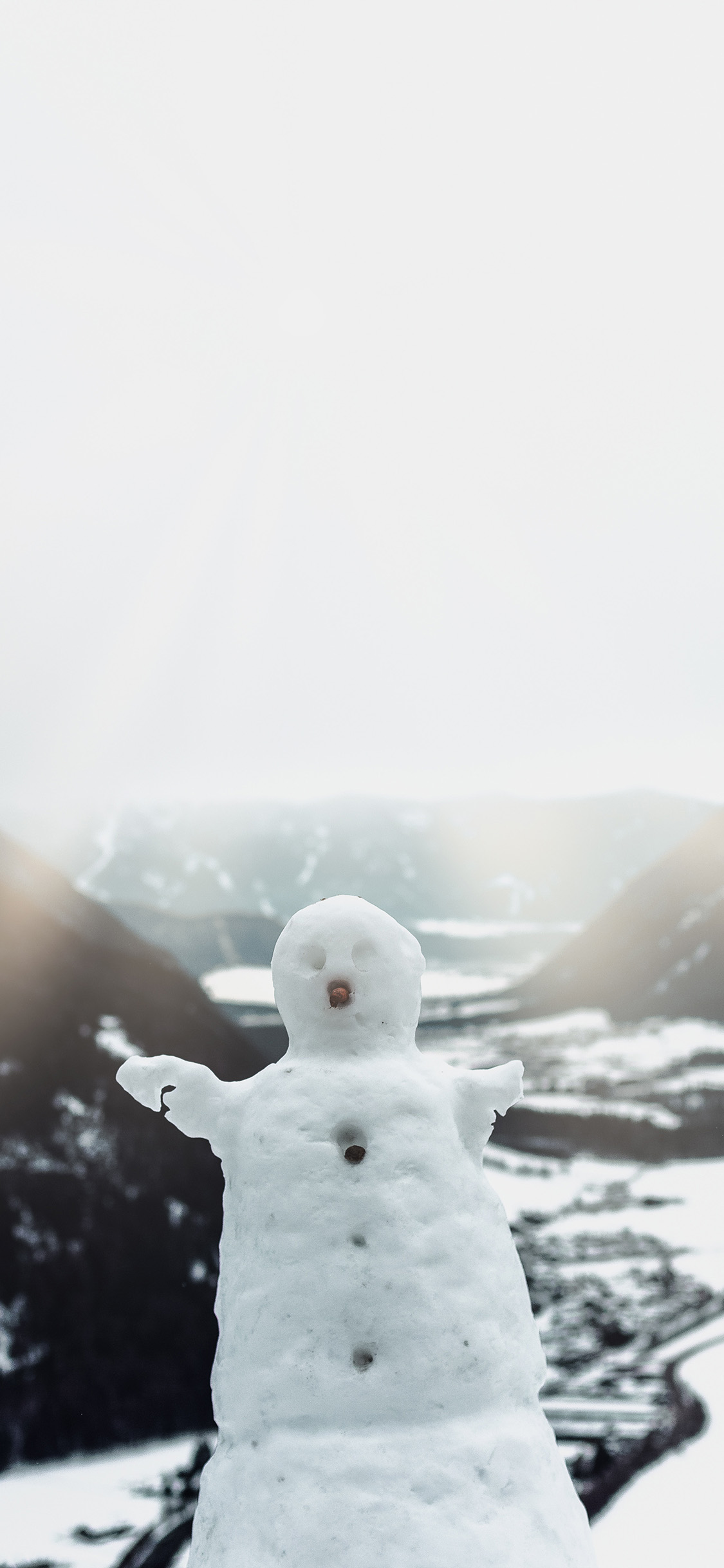[2436×1125]冬季 雪地 美景 雪人 苹果手机壁纸图片