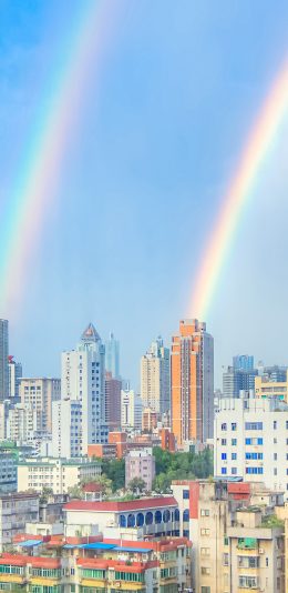 [2436x1125]双彩虹 城市 高楼 天空 苹果手机壁纸图片