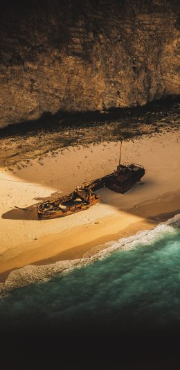[2436x1125]地标 希腊 海岸 沉船湾 苹果手机壁纸图片