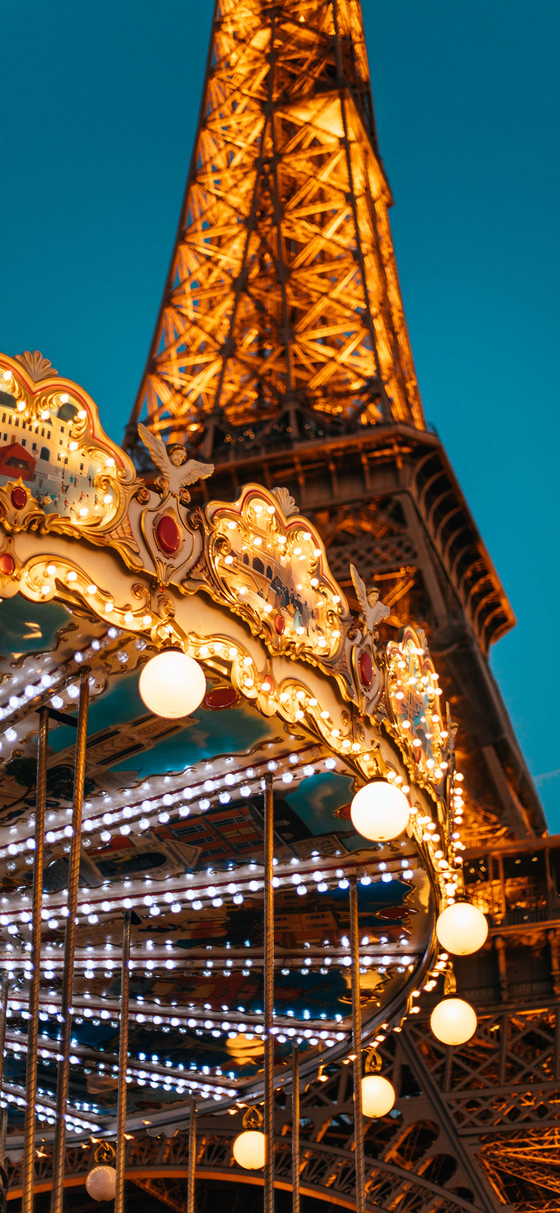 [2436×1125]埃菲尔铁塔 旋转木马 灯光 夜 苹果手机壁纸图片