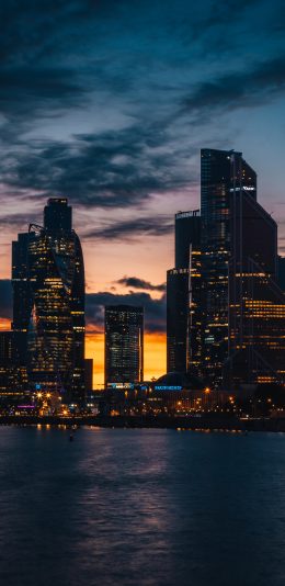 [2436x1125]城市 夜景 夕阳 海平面 苹果手机壁纸图片
