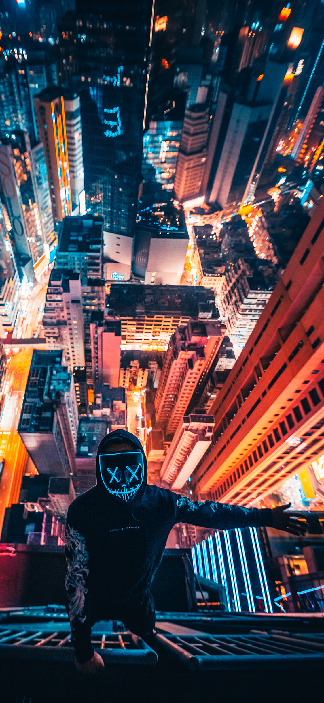 [2436×1125]城市 夜景 建筑 男孩 面具 苹果手机壁纸图片