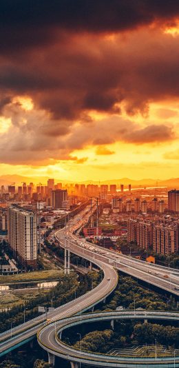 [2436x1125]城市 建筑 立交桥 云空 晚霞 苹果手机壁纸图片
