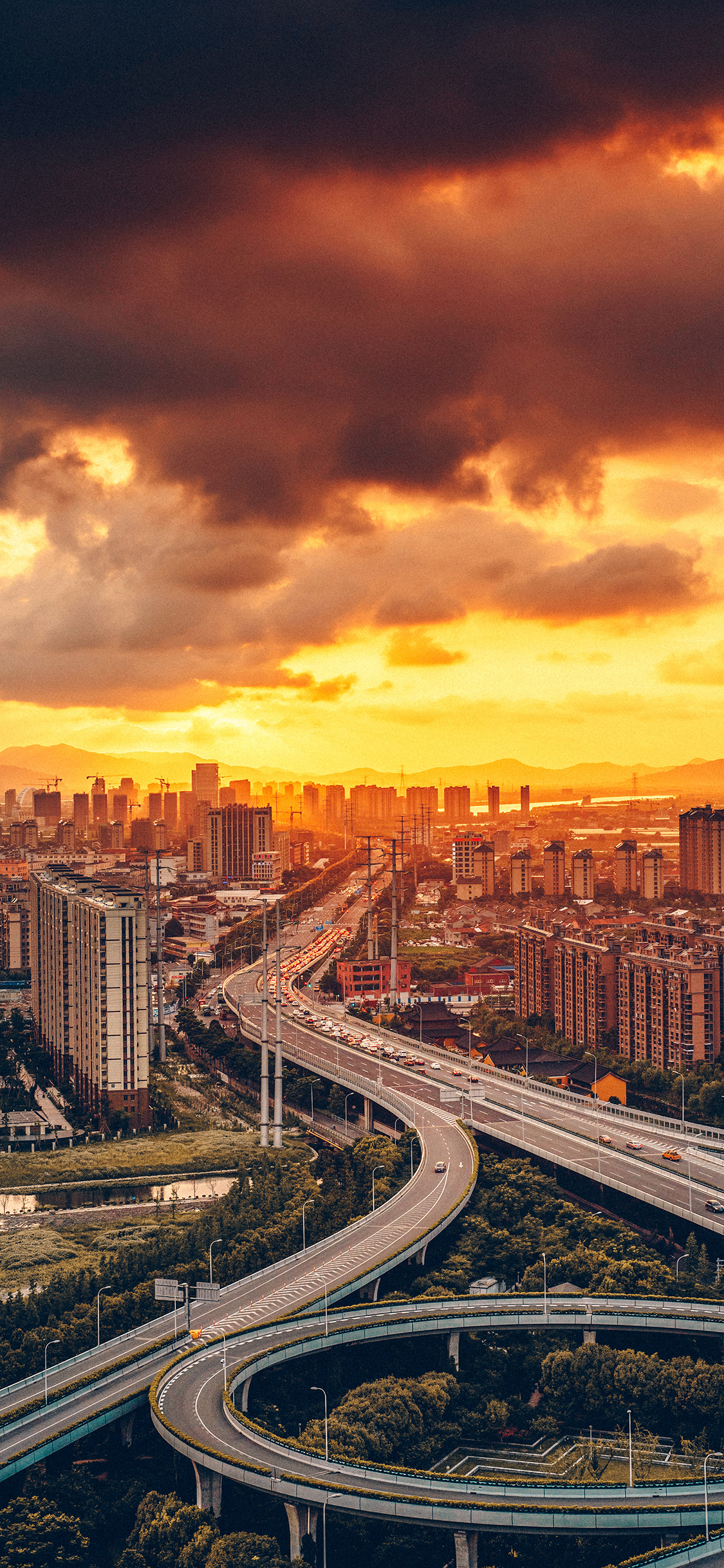 [2436×1125]城市 建筑 立交桥 云空 晚霞 苹果手机壁纸图片