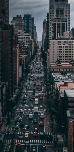[2436x1125]城市 建筑 马路 车辆 苹果手机壁纸图片