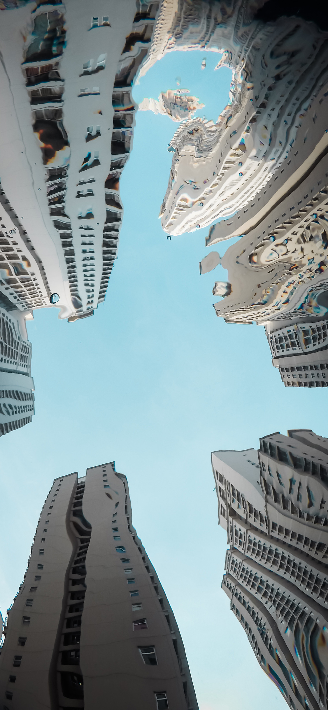 [2436×1125]城市 建筑 高楼 扭曲 苹果手机壁纸图片