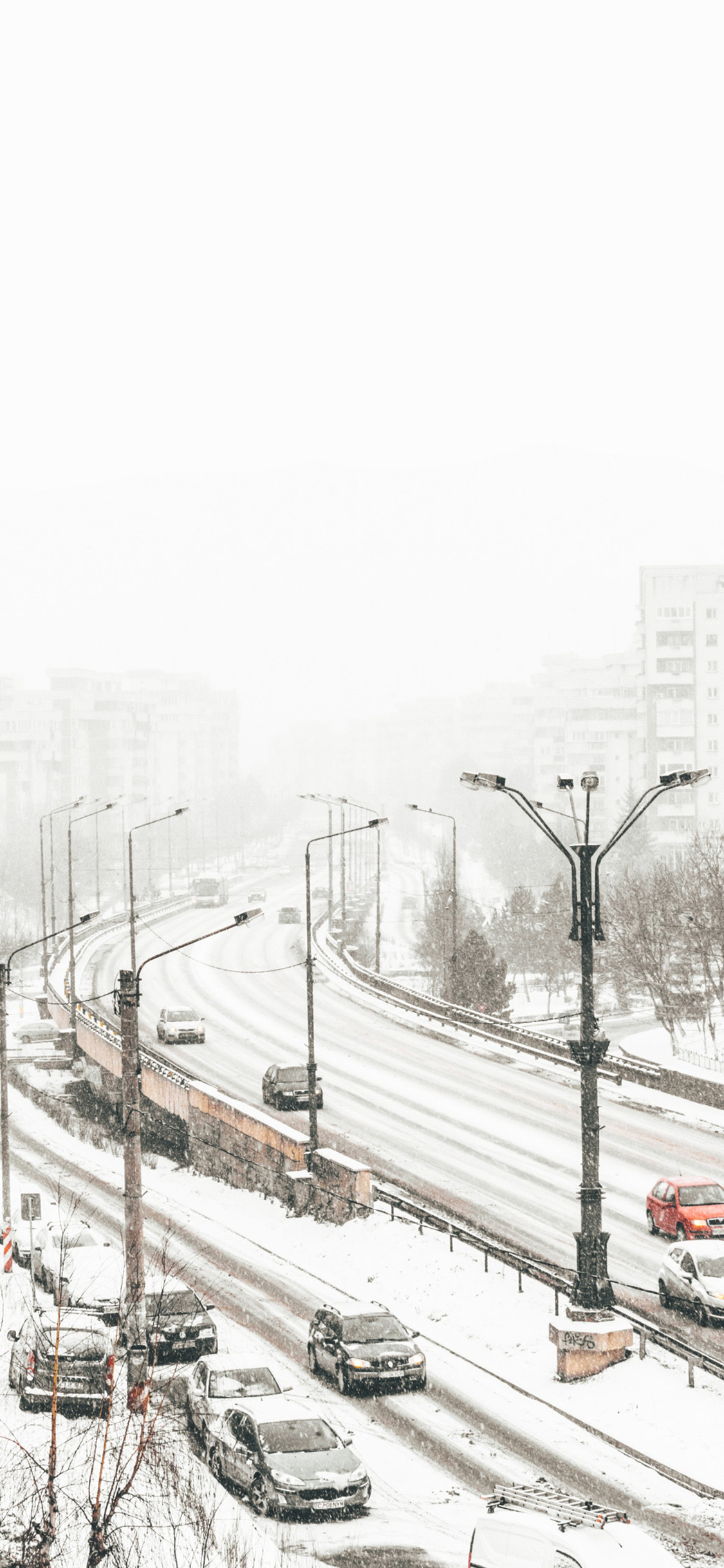 [2436×1125]城市 道路 雪景 覆盖 苹果手机壁纸图片