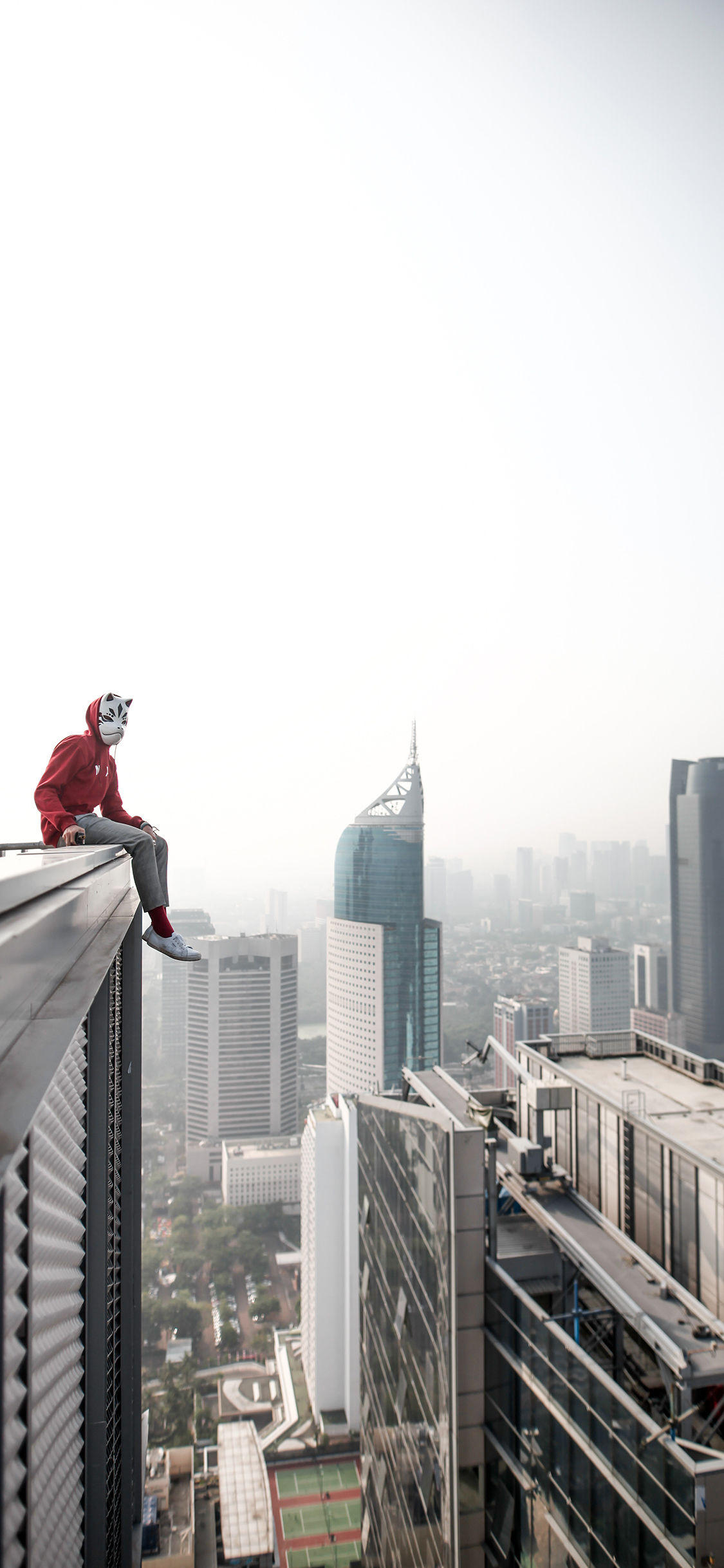 [2436×1125]城市 高楼 建筑 面具人 苹果手机壁纸图片