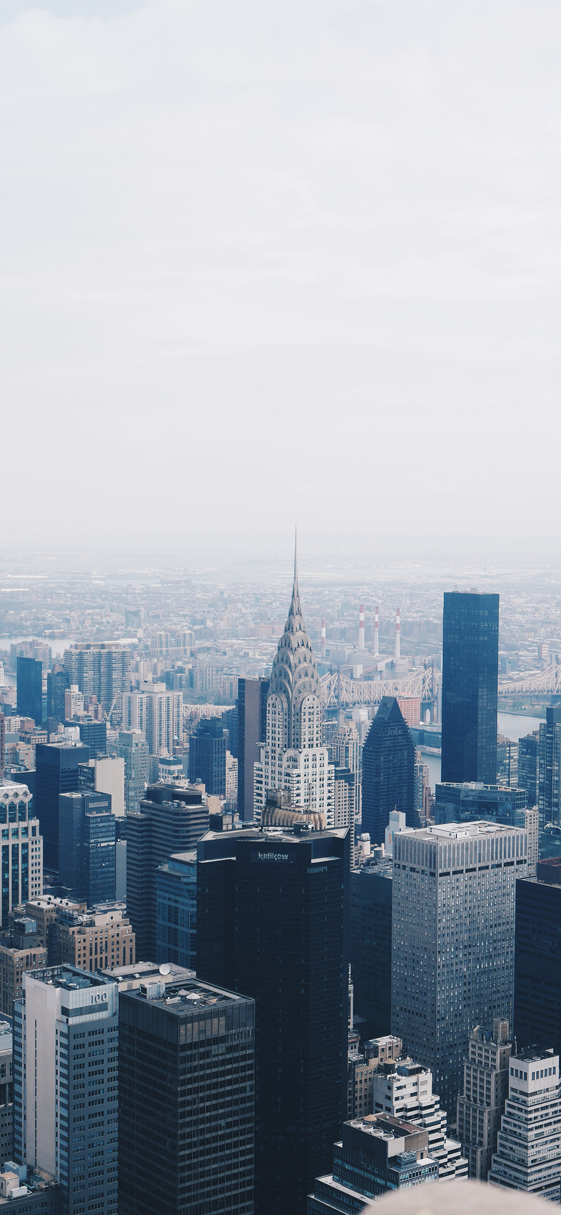 [2436×1125]城市 高楼大厦 远眺 苹果手机壁纸图片