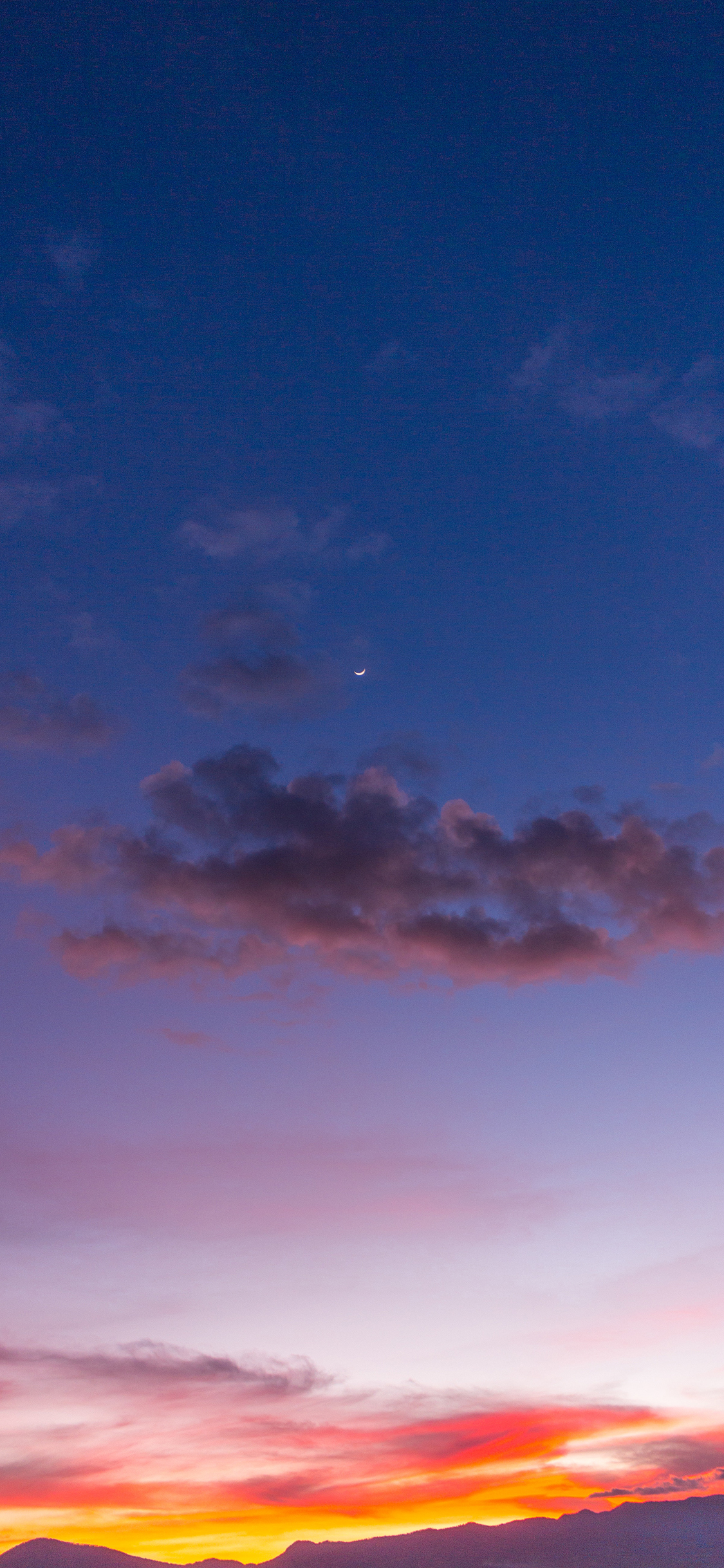 [2436×1125]夕阳 云彩 夜幕 渐变 苹果手机壁纸图片