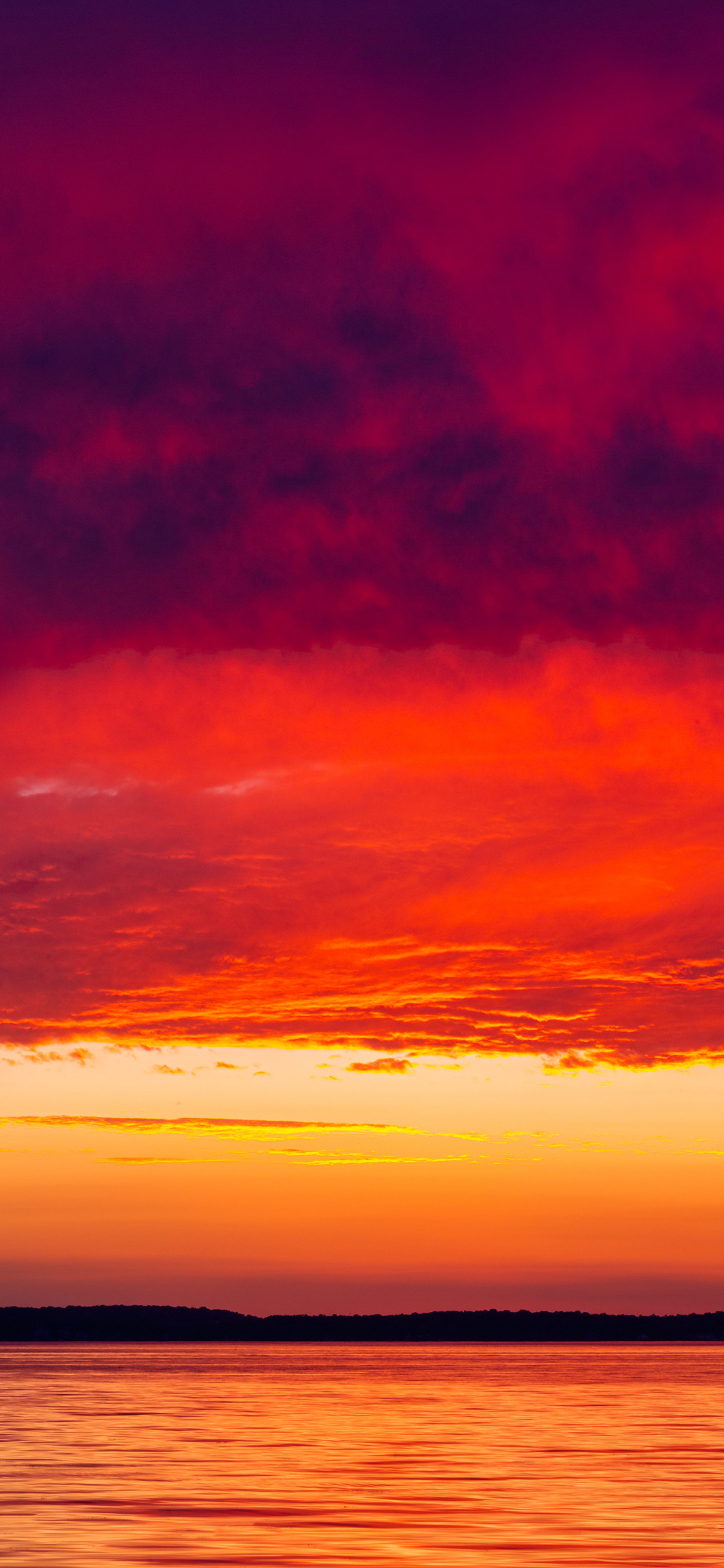 [2436×1125]夕阳 海平面 云层 落日 苹果手机壁纸图片