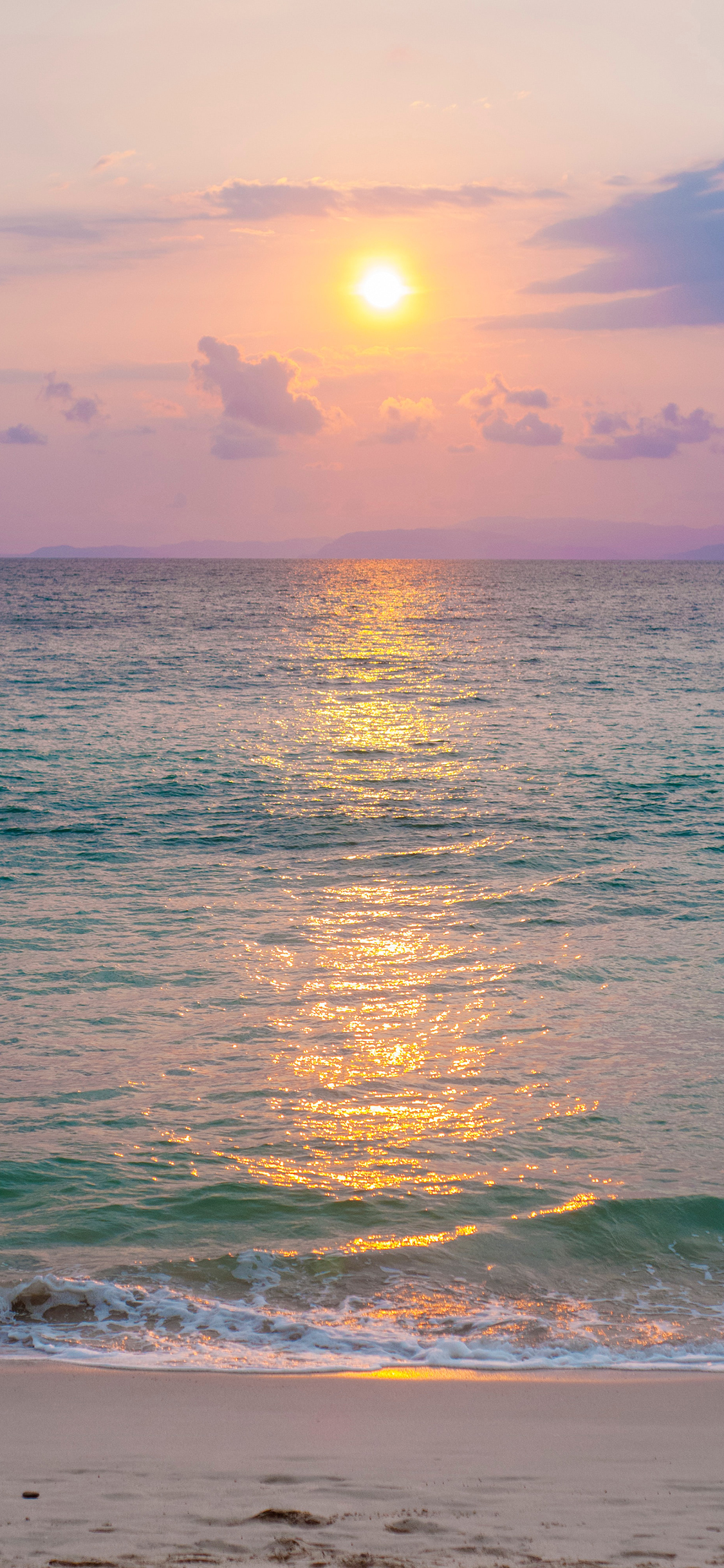 [2436×1125]夕阳 海平面 海水 苹果手机壁纸图片