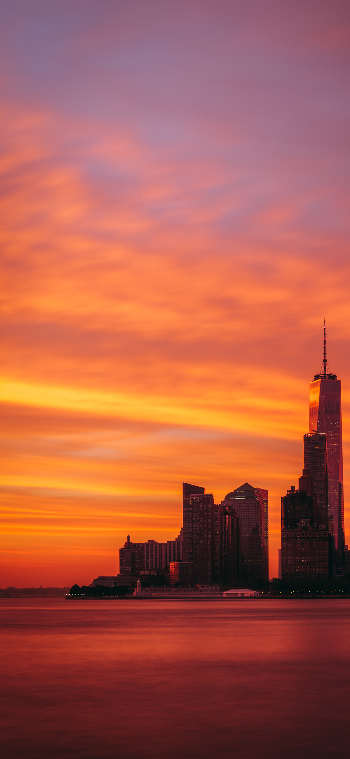 [2436×1125]夕阳 红霞 城市 建筑 唯美 苹果手机壁纸图片