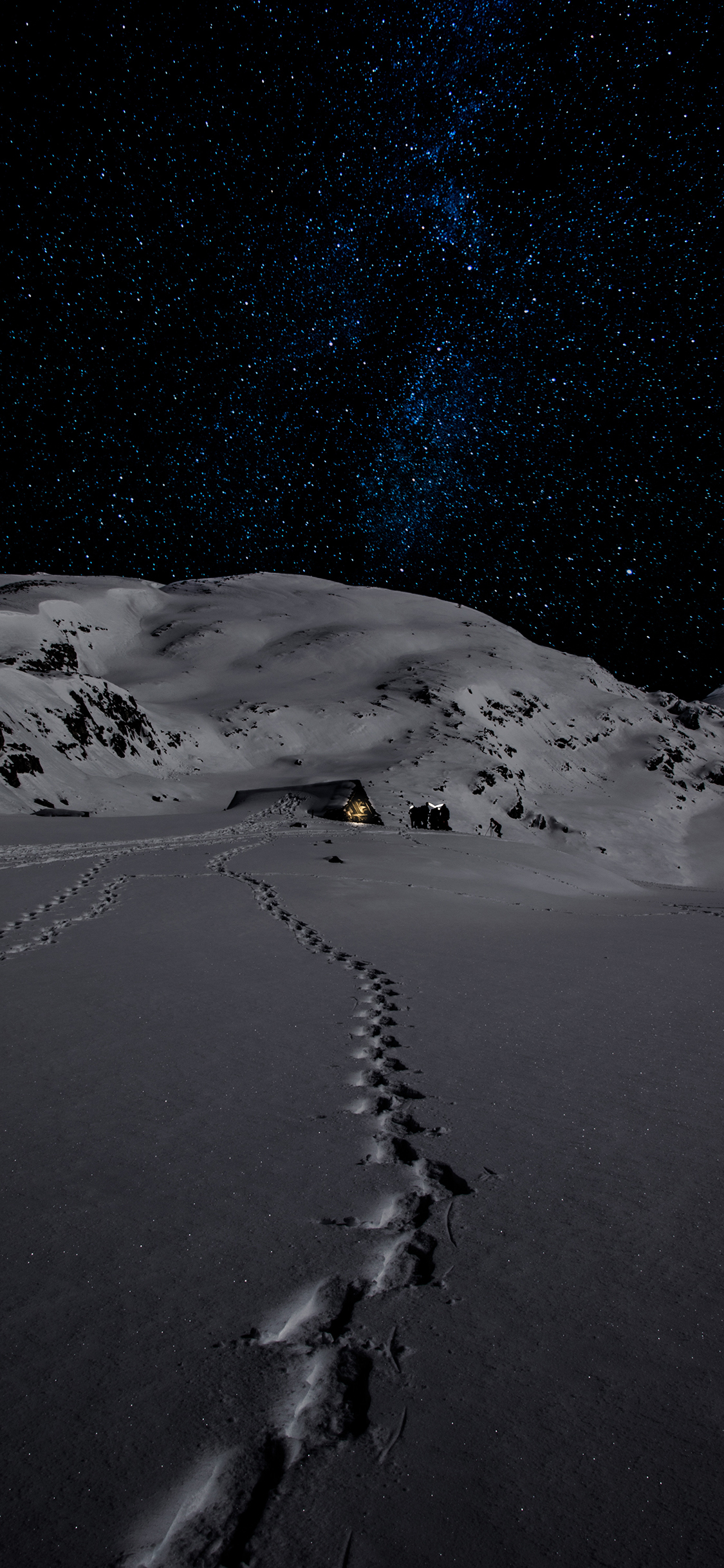 [2436×1125]夜晚 星空 雪地 脚印 苹果手机壁纸图片