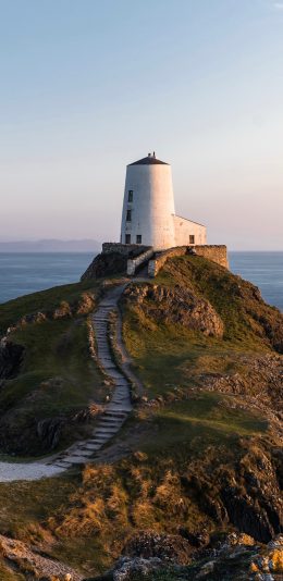 [2436x1125]大海 岩石 建筑 唯美海景 苹果手机壁纸图片