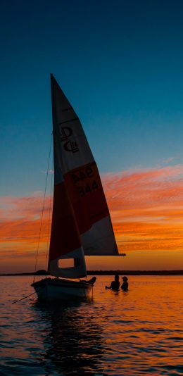 [2436x1125]大海 帆船 夕阳美景 苹果手机壁纸图片