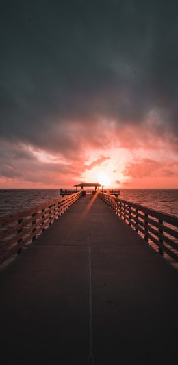 [2436x1125]大海 桥 落日 红霞 自然 苹果手机壁纸图片