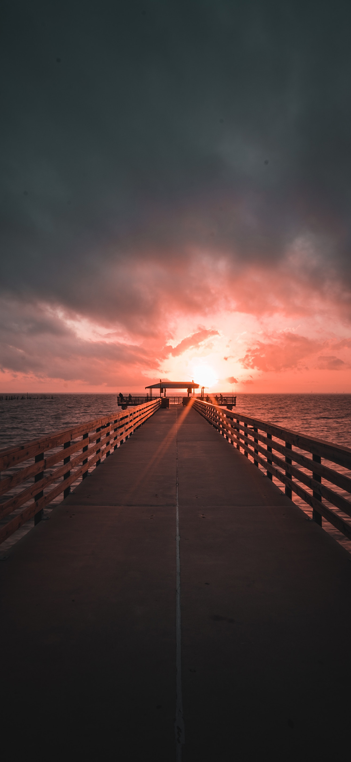 [2436×1125]大海 桥 落日 红霞 自然 苹果手机壁纸图片