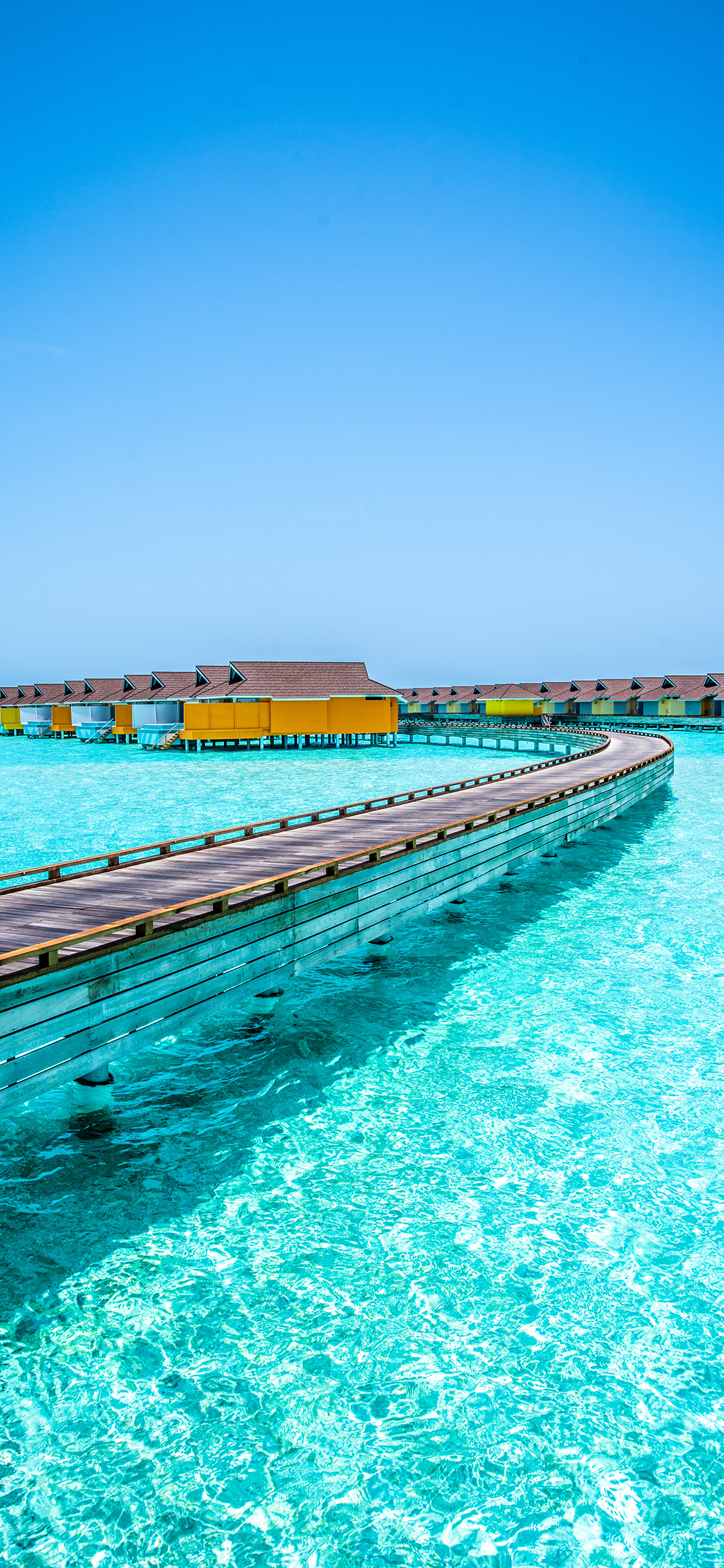 [2436×1125]大海 海水 木栈道 木屋 度假 苹果手机壁纸图片