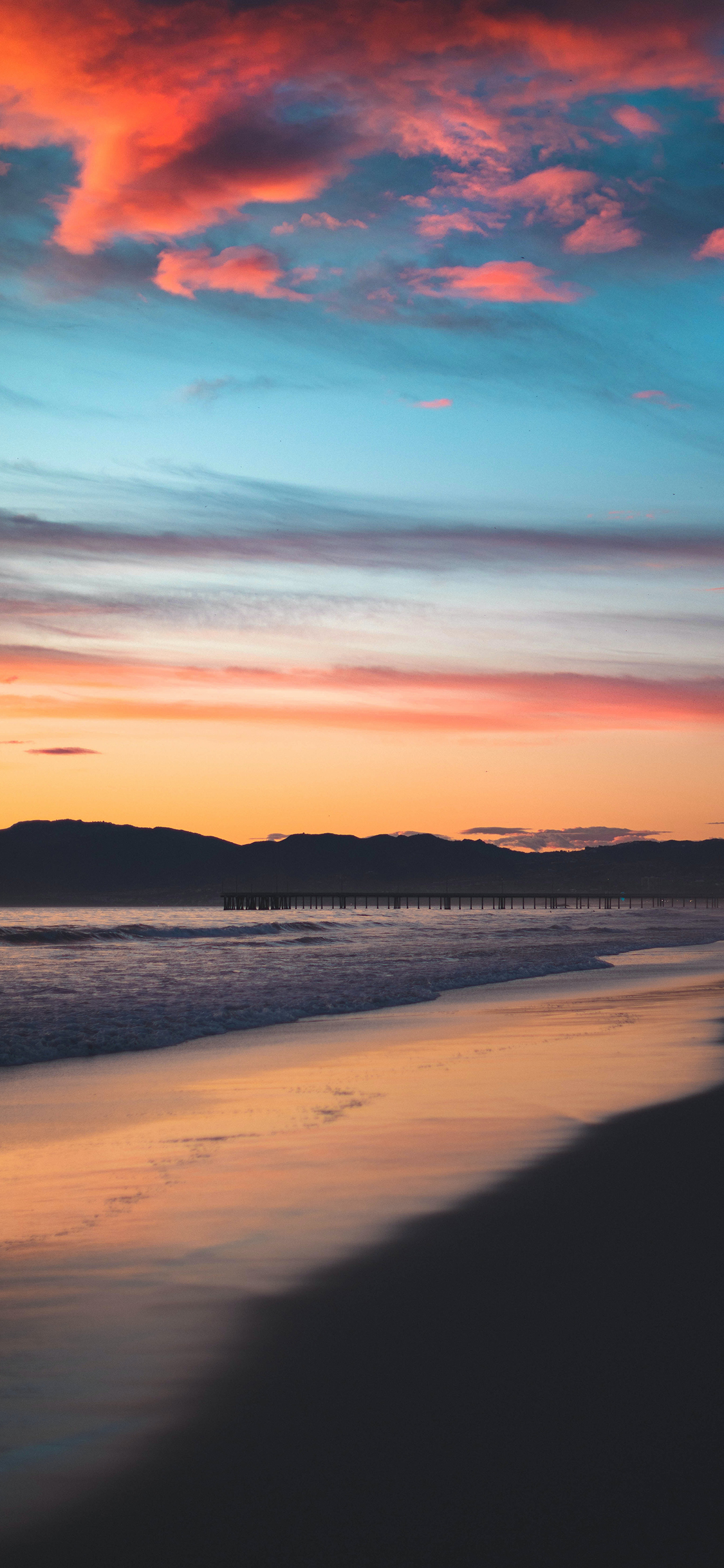[2436×1125]大海 海滩 云空 红霞 苹果手机壁纸图片