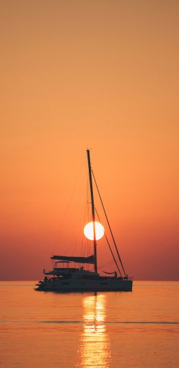 [2436x1125]大海 船只 夕阳 唯美 苹果手机壁纸图片