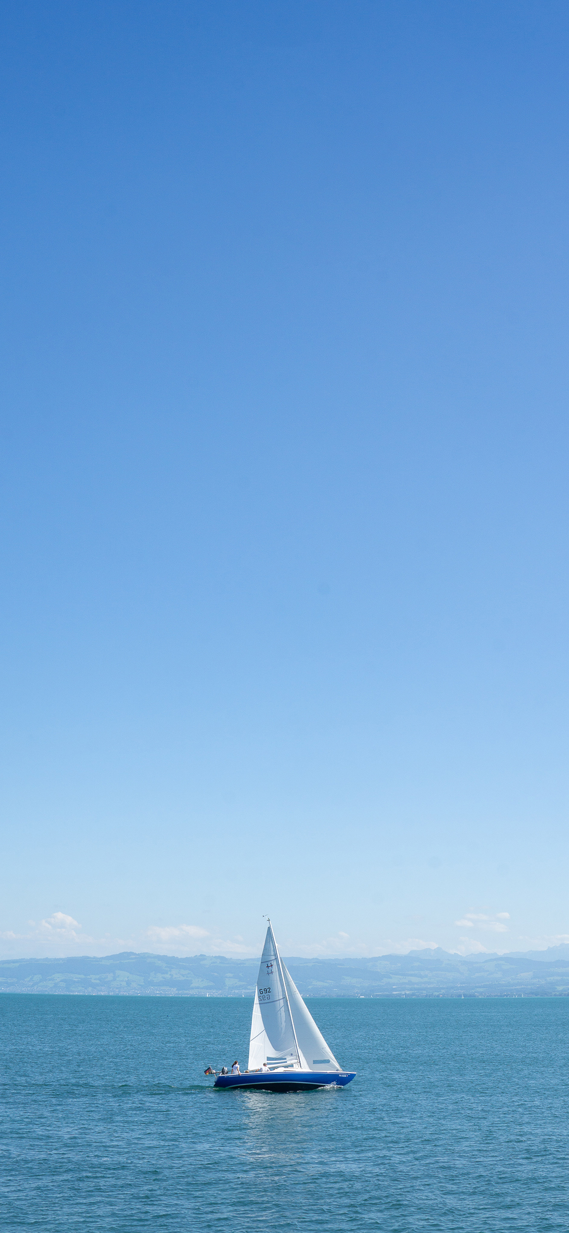 [2436×1125]帆船 大海 蔚蓝 船只 苹果手机壁纸图片
