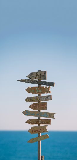 [2436x1125]指示牌 外语 海边 箭头 木板 苹果手机壁纸图片