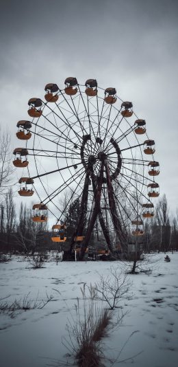 [2436x1125]摩天轮 游乐设施 天空 雪地 苹果手机壁纸图片