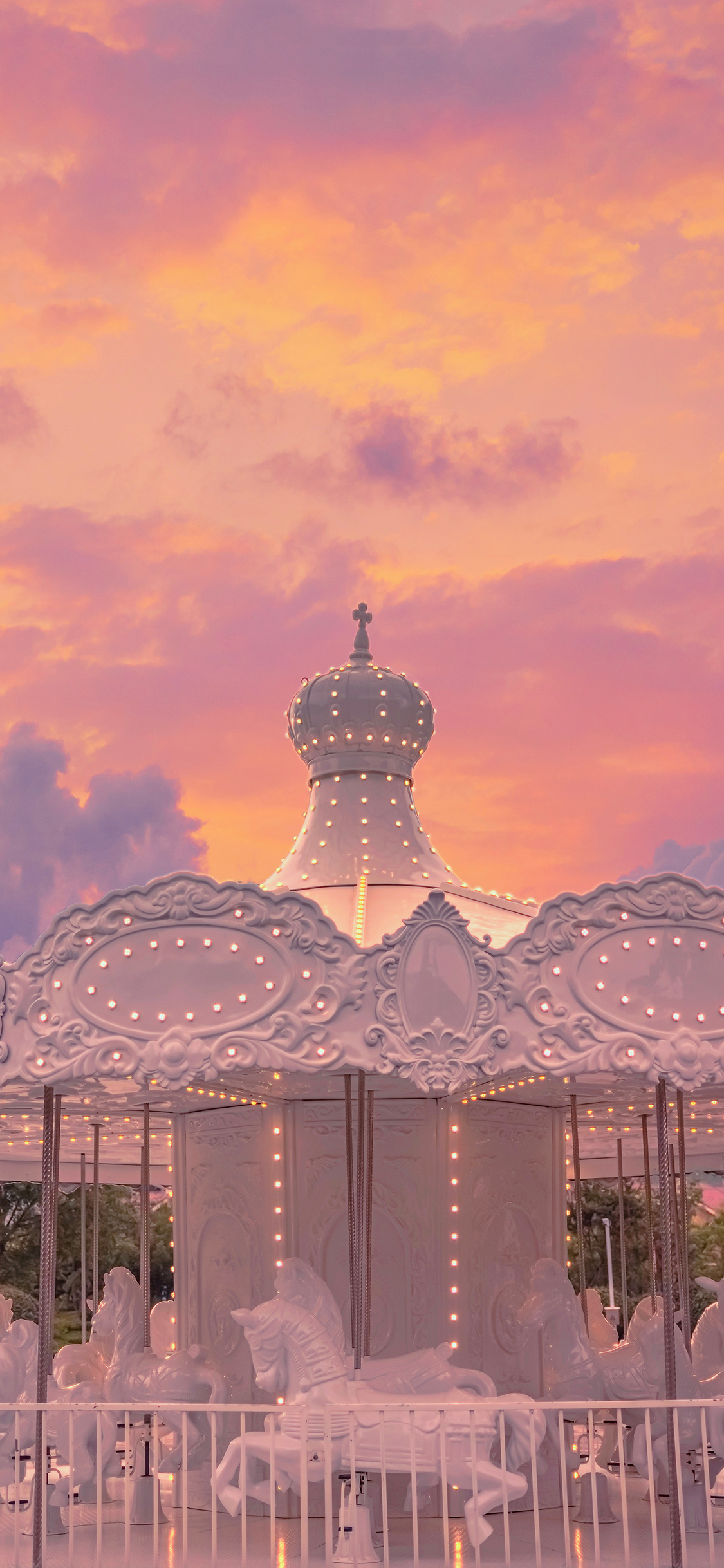 [2436×1125]旋转木马 游乐场 娱乐 太空 粉色 苹果手机壁纸图片