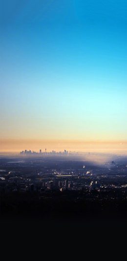 [2436x1125]日出 城市 晨曦 蓝色 渐变 天空 苹果手机壁纸图片