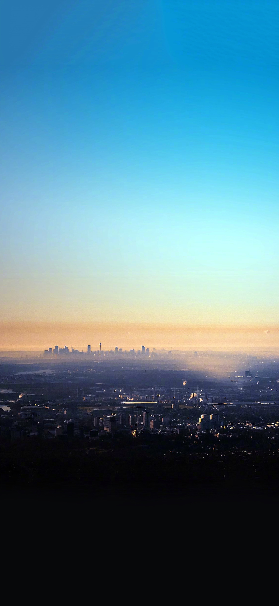 [2436×1125]日出 城市 晨曦 蓝色 渐变 天空 苹果手机壁纸图片