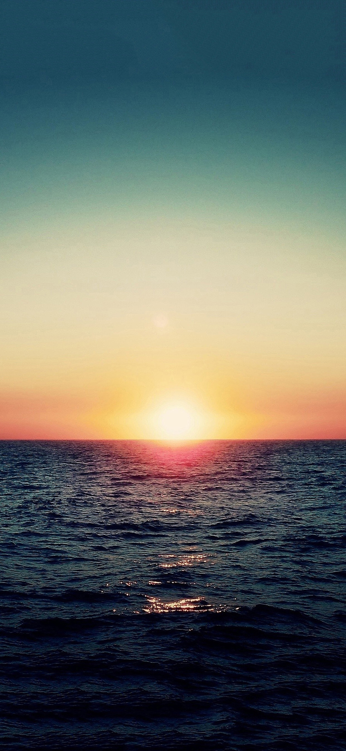 [2436×1125]日出 大海 天空 暖色 苹果手机壁纸图片