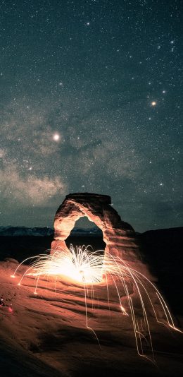 [2436x1125]星空 岩石 烟花 夜景 苹果手机壁纸图片