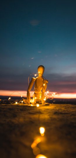 [2436x1125]木人 灯光 沙滩 创意 苹果手机壁纸图片