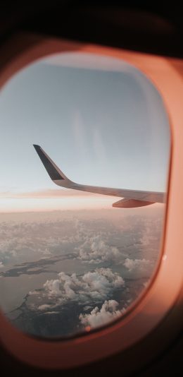 [2436x1125]机窗 飞机 机尾 云空 苹果手机壁纸图片