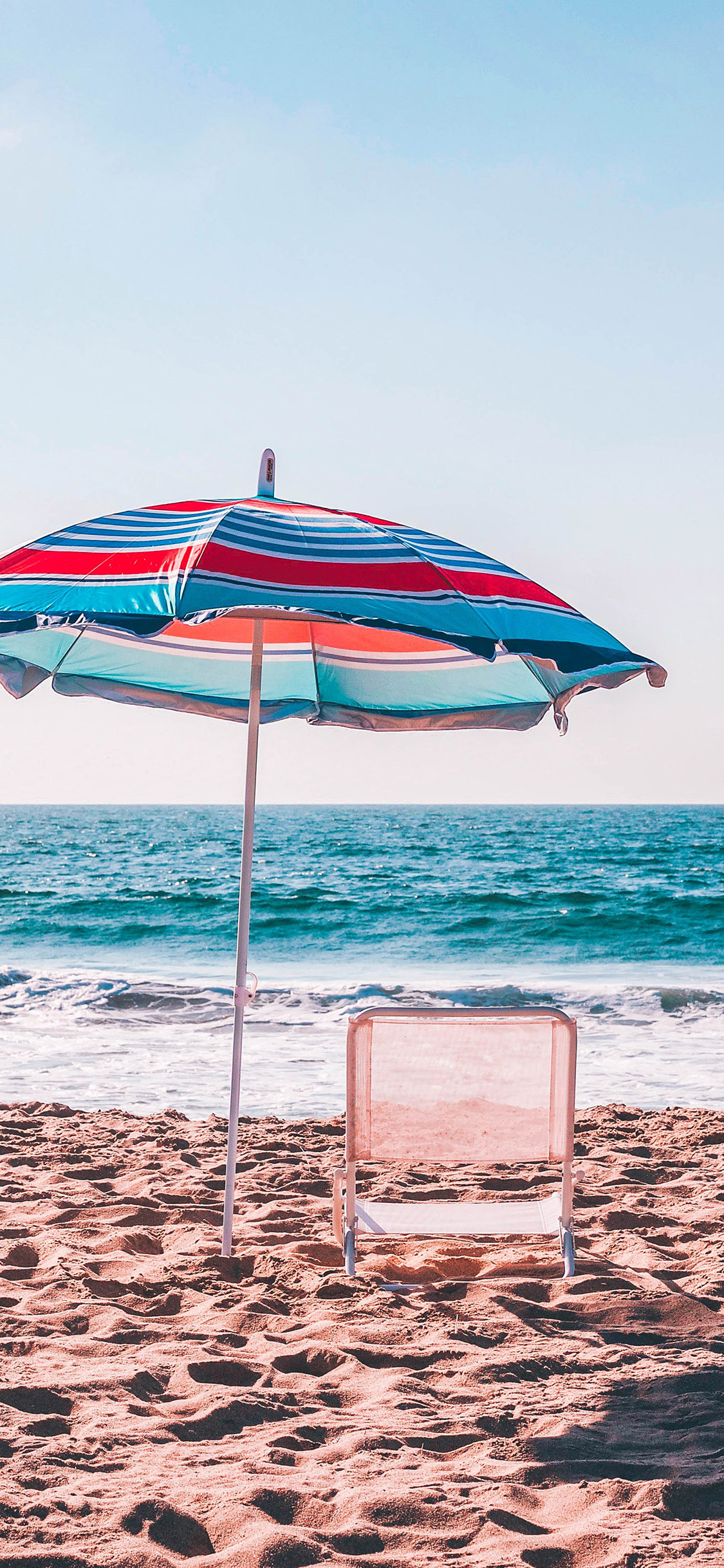 [2436×1125]沙滩 海浪 大海 海岸 苹果手机壁纸图片