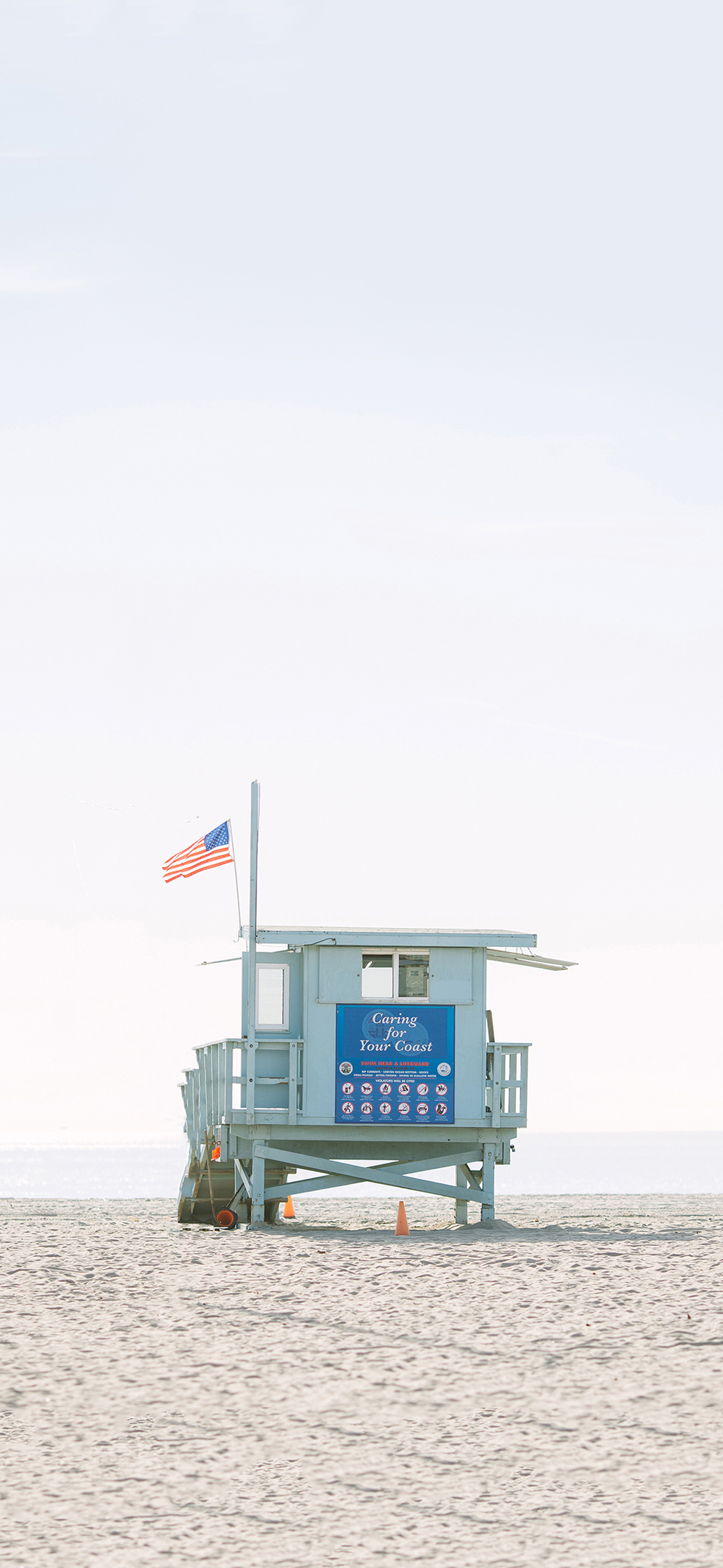 [2436×1125]沙滩 清新 房屋 旗帜 苹果手机壁纸图片