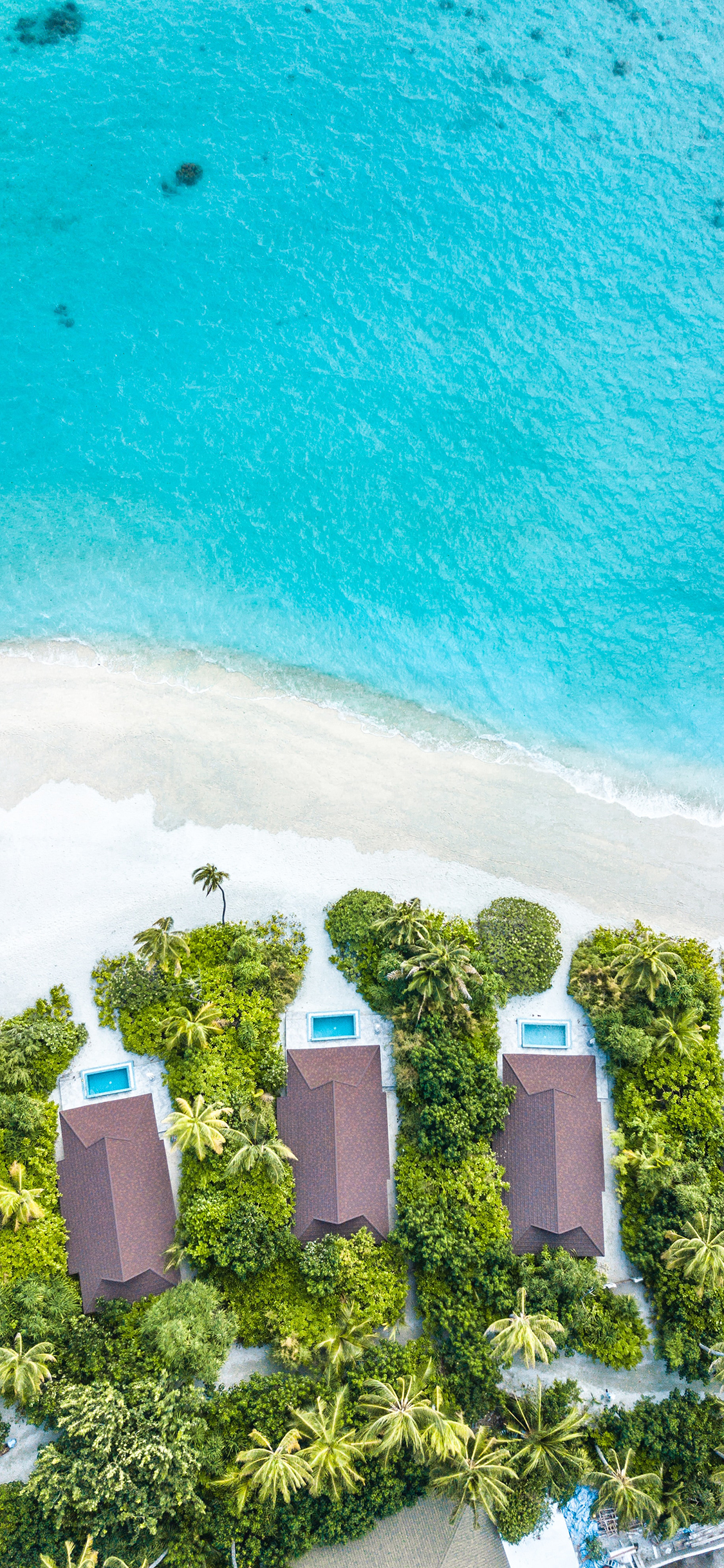 [2436×1125]海岸 岛屿 沙滩 度假 建筑 苹果手机壁纸图片