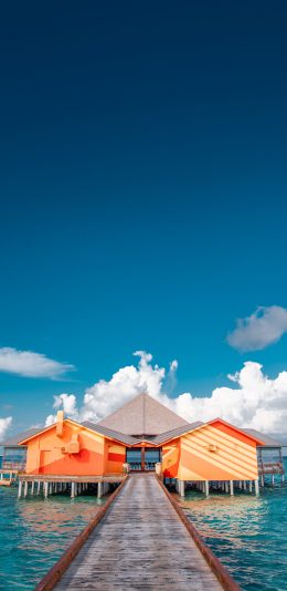 [2436x1125]海岸 度假 海上别墅 大海 蓝天 苹果手机壁纸图片