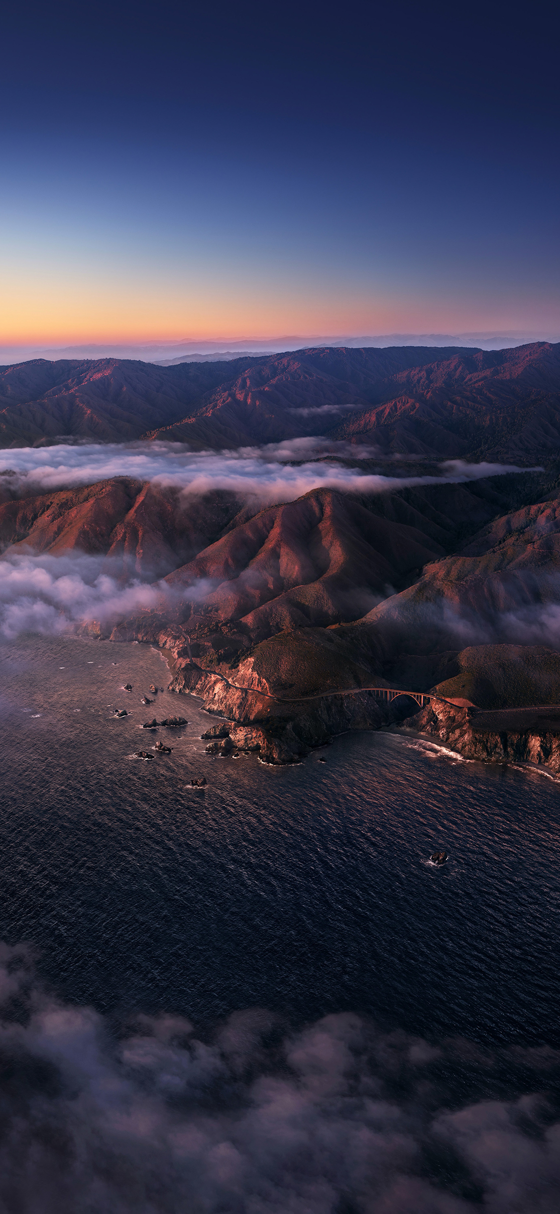 [2436×1125]海峡 山脉 大海 海岸 云层 苹果手机壁纸图片