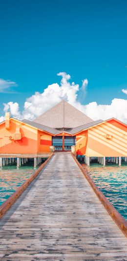 [2436x1125]海景 度假屋 蓝天白云 休闲 苹果手机壁纸图片