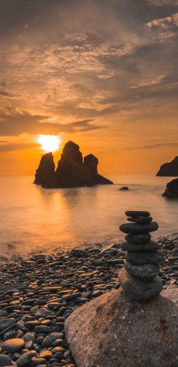 [2436x1125]海景 落日 石头 自然美景 苹果手机壁纸图片