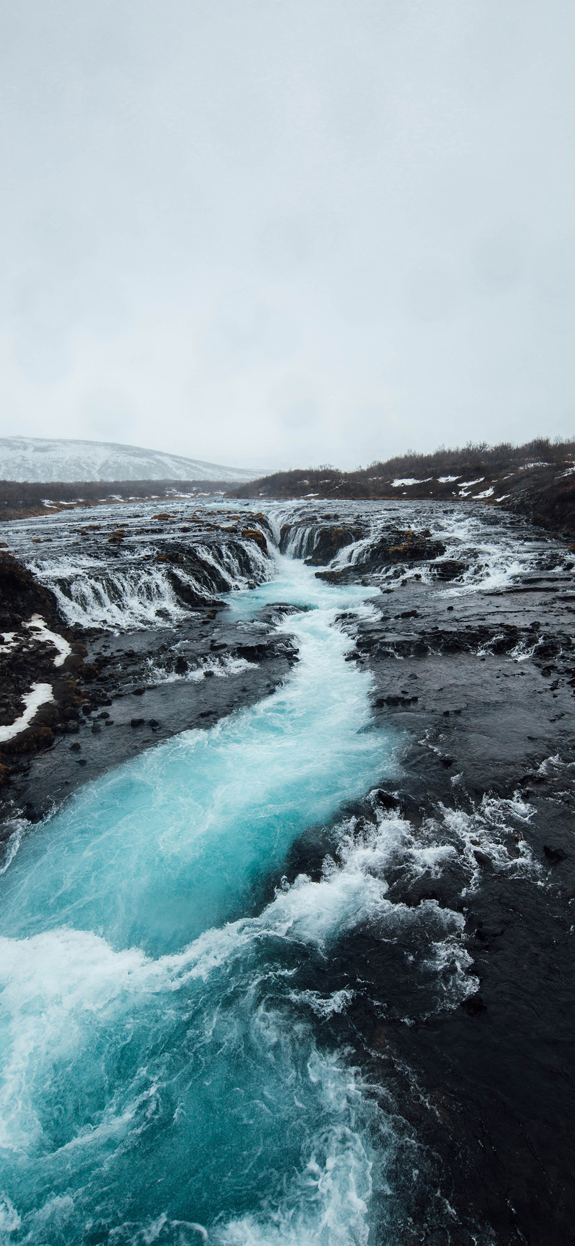 [2436×1125]海水 汇集 山峰 岩石 苹果手机壁纸图片