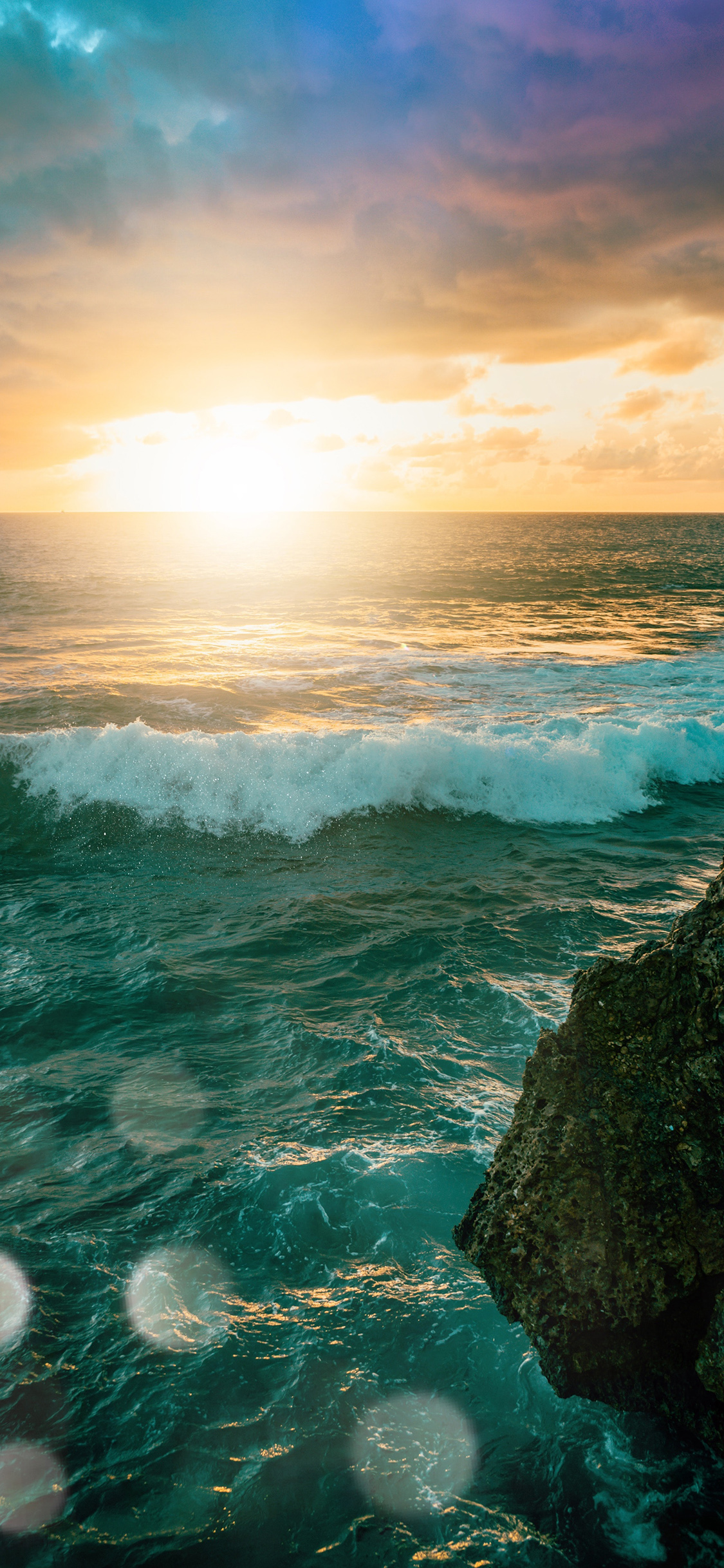 [2436×1125]海水 海浪 太阳 云海 苹果手机壁纸图片