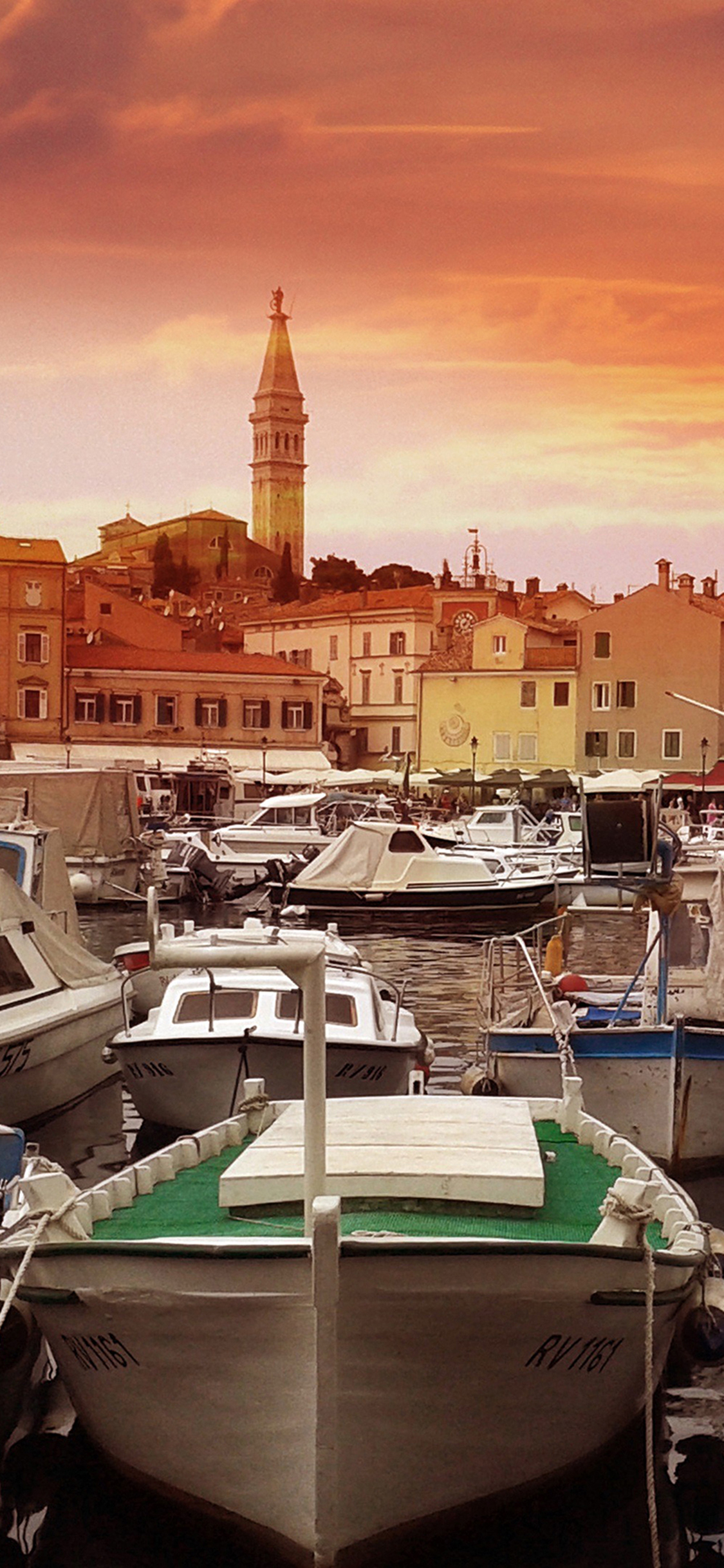 [2436×1125]渔船港口 夕阳 渔船 快艇 苹果手机壁纸图片