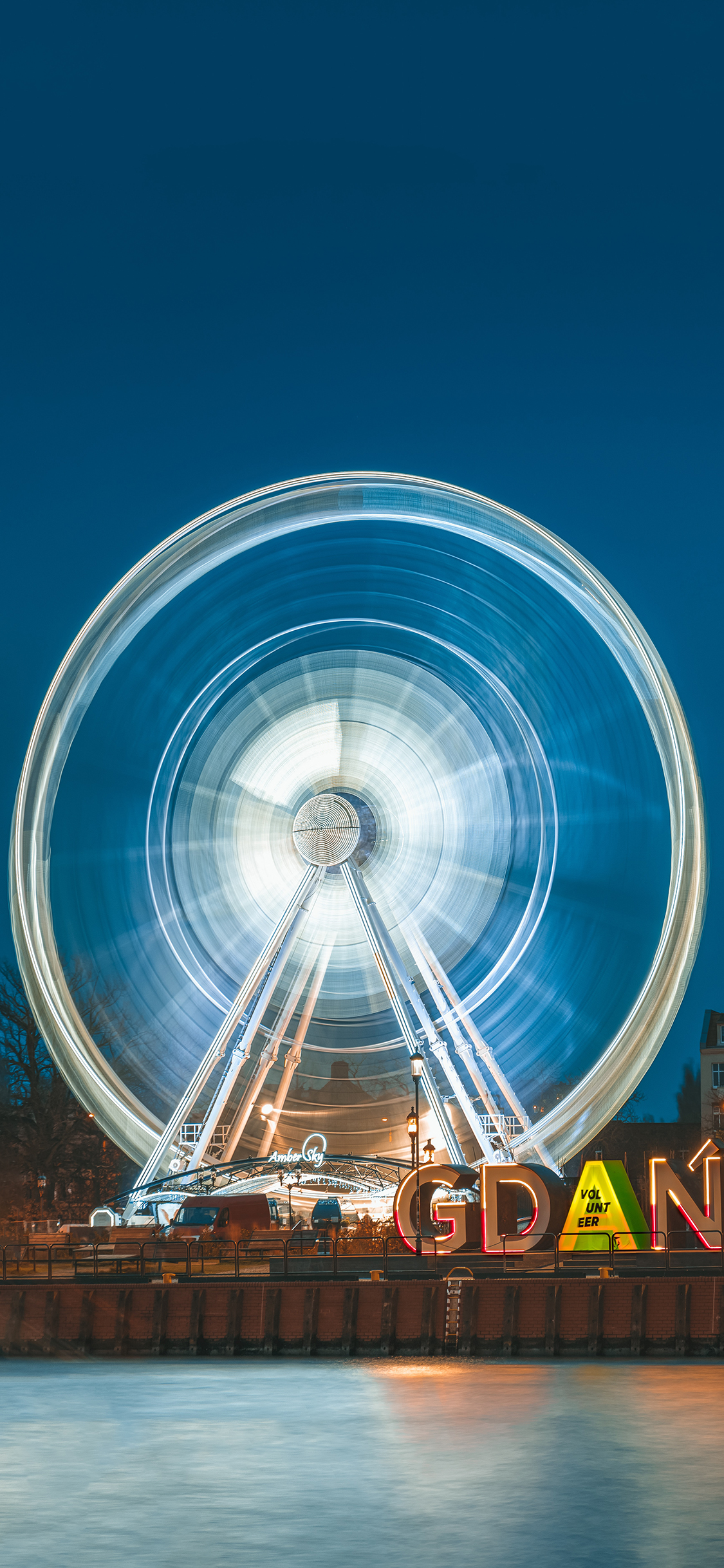 [2436×1125]游乐场 设施 摩天轮 旋转 速度 苹果手机壁纸图片