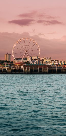 [2436x1125]游乐场 设施 摩天轮 海水 苹果手机壁纸图片